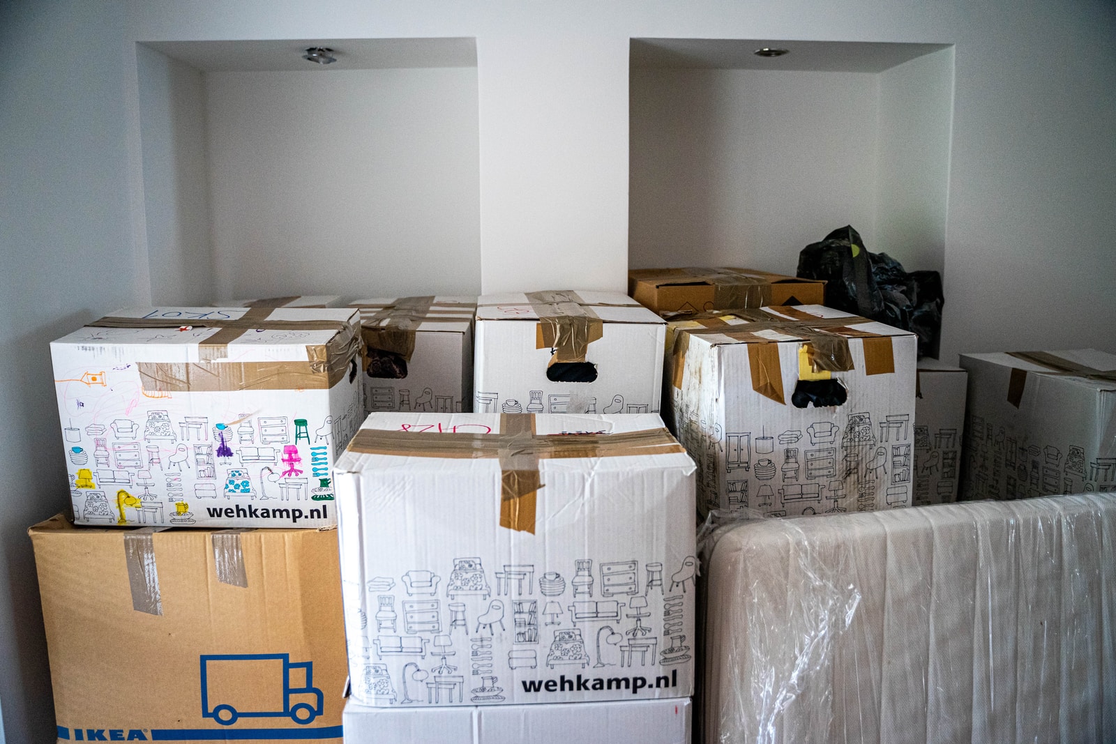 white room full of packaged boxes